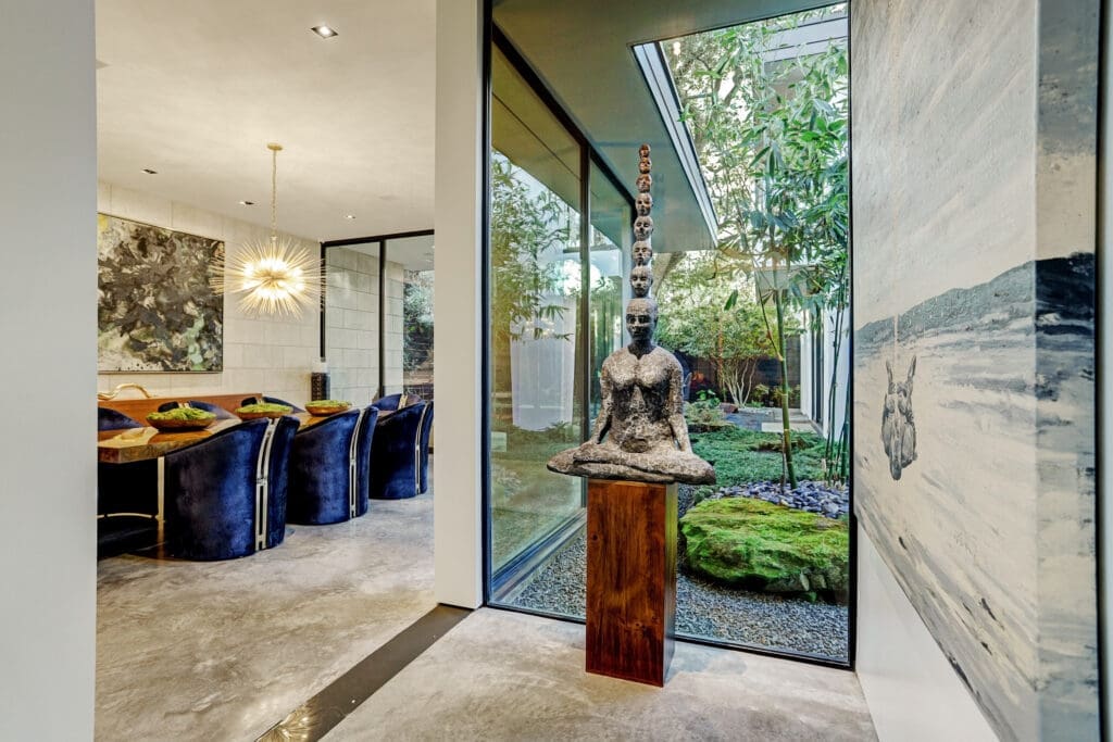 The thoughtful design and details of the estate include multiple landscaped courtyards, designed and installed by Johnny Steel Design, incorporating a Japanese aesthetic.