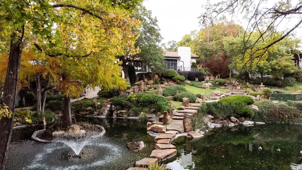 4900 Westridge enjoys a shared five acre retreat filled with ponds and gardens. (Courtesy photo)