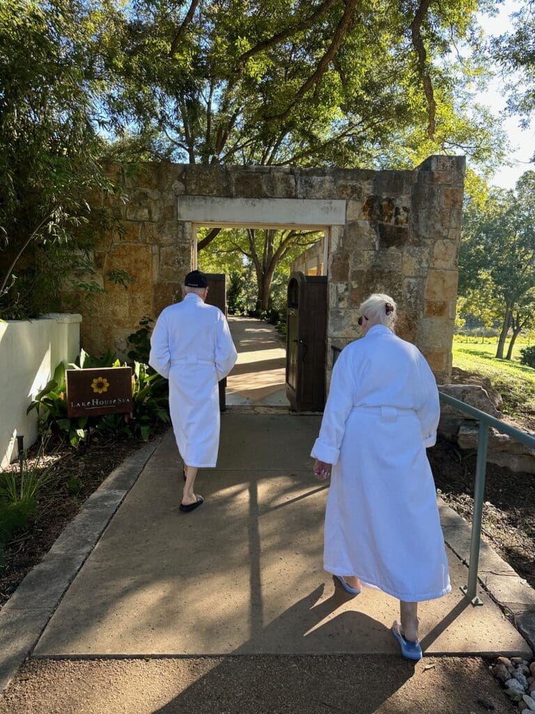 The Lake House Spa is just a short walk from your room. Here Claridge's parents dressed in their robes head to their spa treatments. (Photo by Courtesy of Lake Austin Spa Resort)