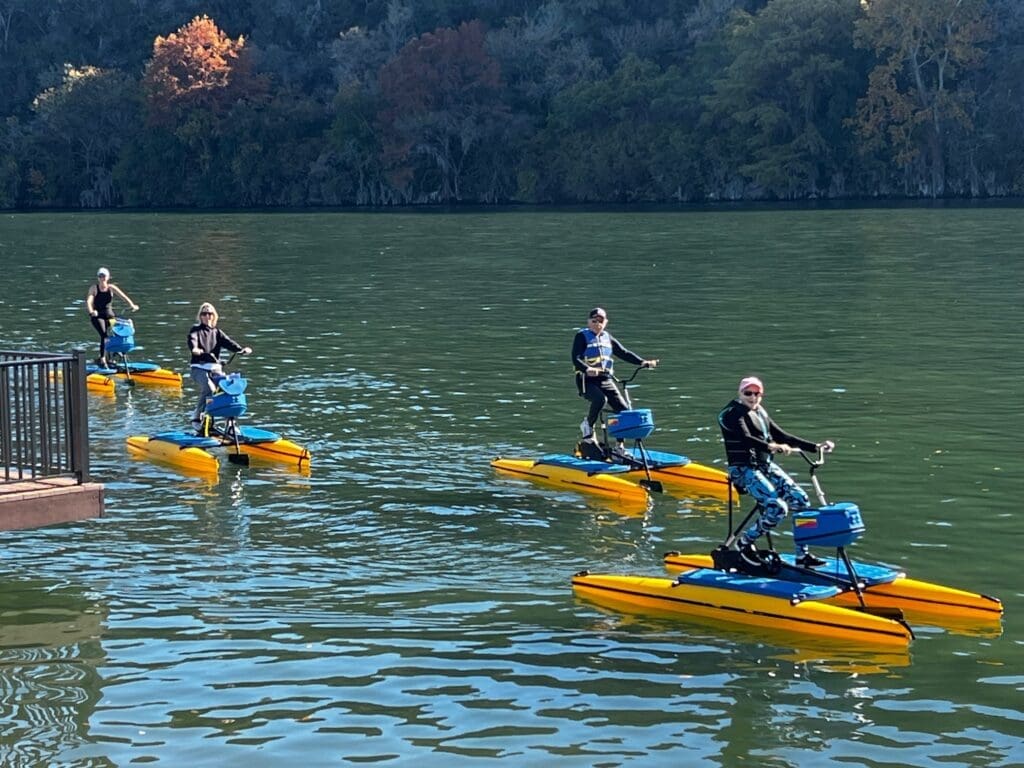 Claridge, her sister and parents hydro-biking on Lake Austin. (Photo by Courtesy of Lake Austin Spa Resort)