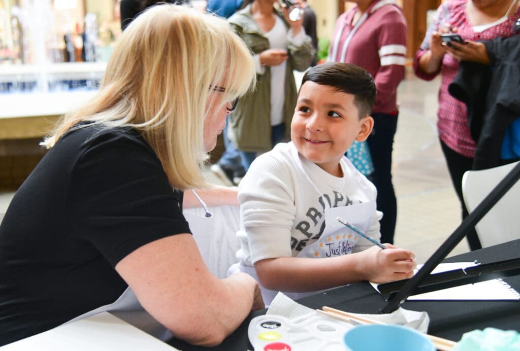 A Children's Cancer Fund shopping experience. (Photo by Grant Miller Photography)
