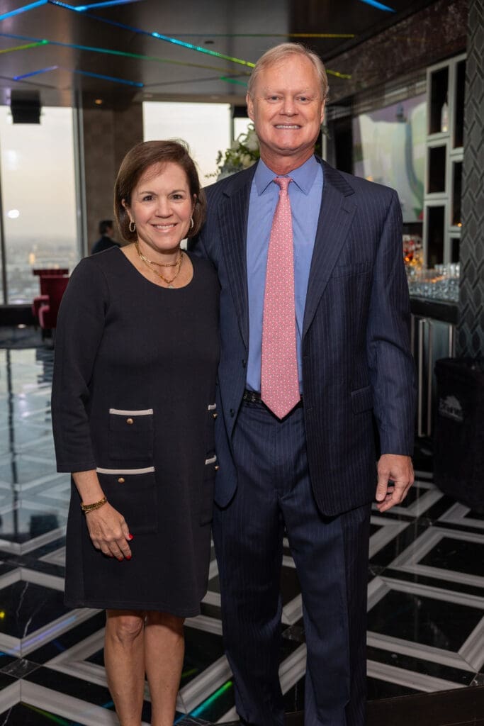 Mary Eliza & Park Shaper at the Texas Children's Houston Open Tee-Off in the penthouse suite at the Post Oak Hotel.  (Photo by Jenny Antill)