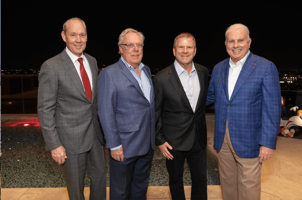 Jim Crane, Mike Linn, Tilman Fertitta, Mark A. Wallace — the big guns at the Texas Children's Houston Open Tee-Off party held in the two-story penthouse suite at Fertitta's Post Oak Hotel. (Photo by Jenny Antill)