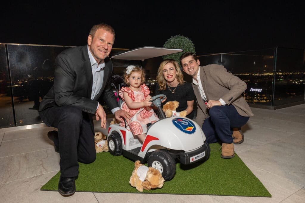Tilman & Lauren Fertitta with their daughter, Elle, and Blake Fertitta at the Texas Children's Houston Open Tee-Off in the penthouse suite at the Post Oak Hotel.  (Photo by Jenny Antill)