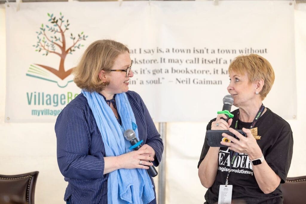 Village Books owner Teresa Kenney (right) introduced an author at the Festival last year.  