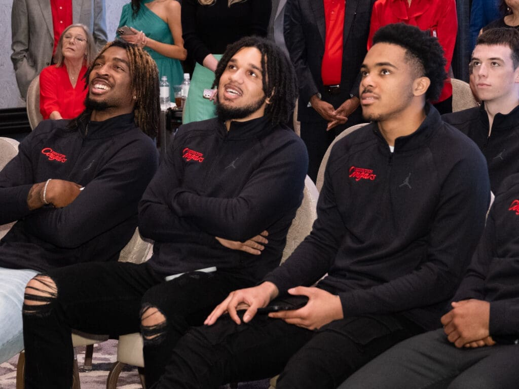 Ja'Vier Francis, Emanuel Sharp and Ramon Walker Jr. enjoyed seeing Houston's NCAA Tournament path on Selection Sunday. (Photo by F. Carter Smith)