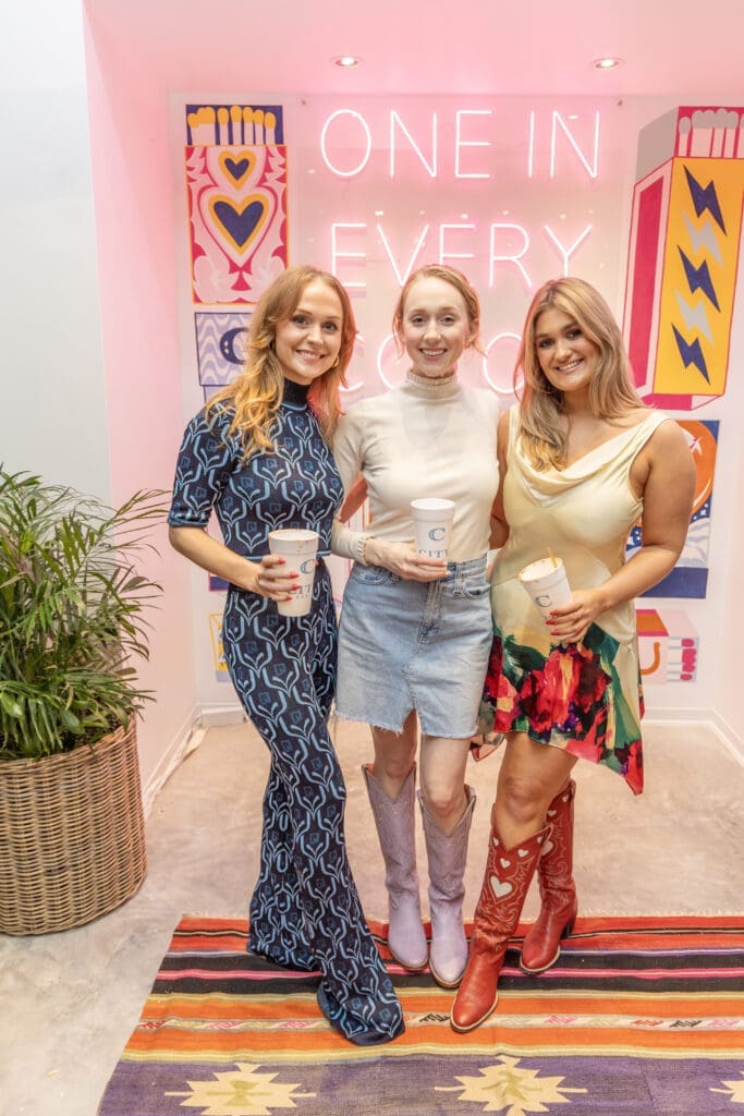 Caroline Sage, Elizabeth McLaurin, Grace Margaret Berndt at the opening of City Boots in Autry Park.  (Photo by Jordan Geibel)