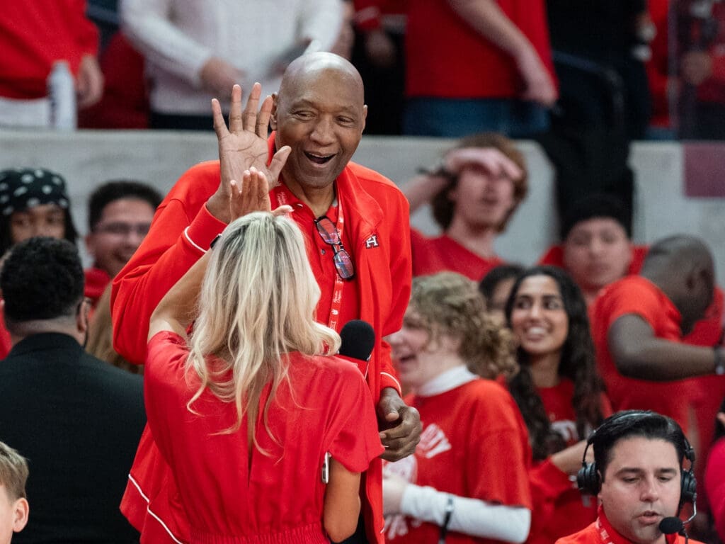 University of Houston legend turned broadcaster Elvin Hayes and game host Lauren Leal share a Fertitta Center moment. (Photo by F. Carter Smith)