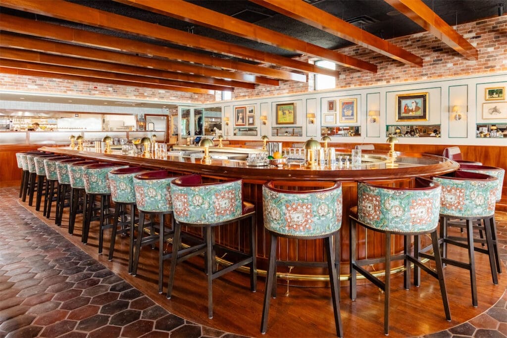The bar at Jack & Harry’s is a warm and intimate space with turn-of-the-century character. (Photo by Kayla Enright)