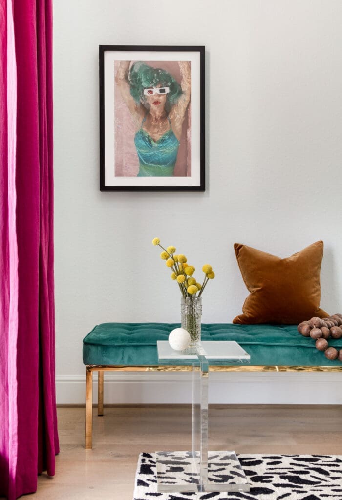 The raspberry drapery is another colorful touch for Lohman's home office.