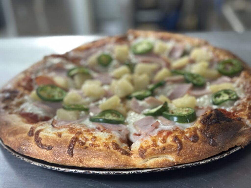 The Hawaiian pizza with Canadian bacon, pineapple and jalapeno at Buffalo Bros.