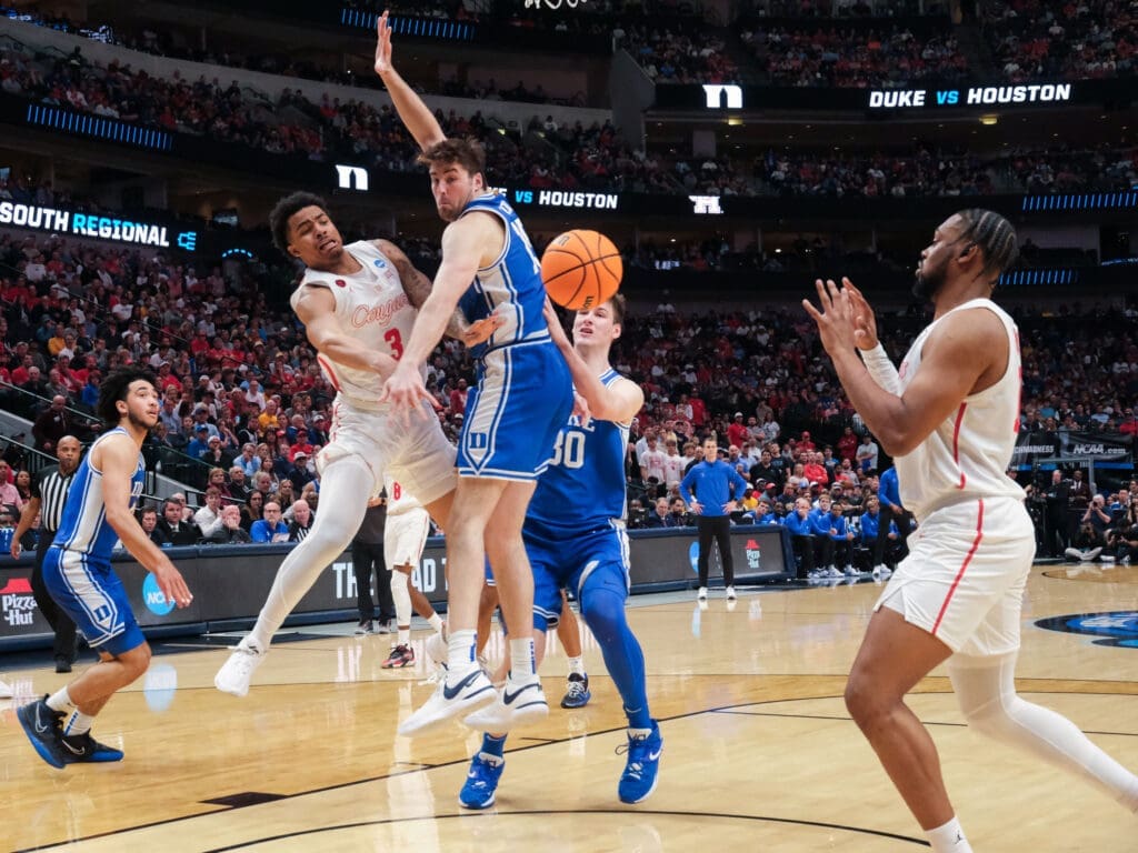 Ramon Walker Jr. can be creative with the basketball for Houston too. (Photo by F. Carter Smith)