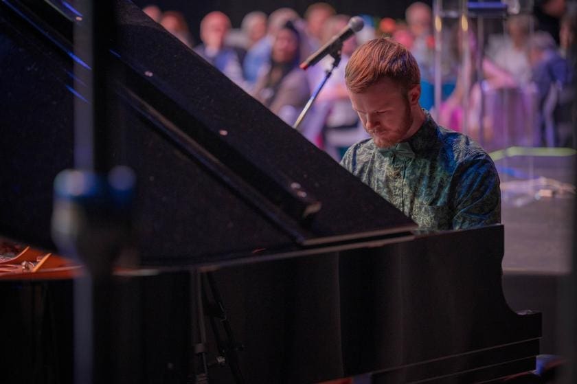 University of Texas-Austin senior Matthew Nell delighted the crowd with two pieces - one an original composition.  Nell is a graduate of Willis High School. (Photo by Scott Shaver)