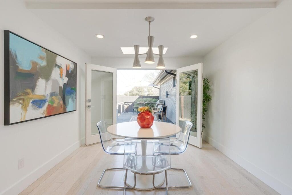 The breakfast nook opens to its own deck for al fresco dining.