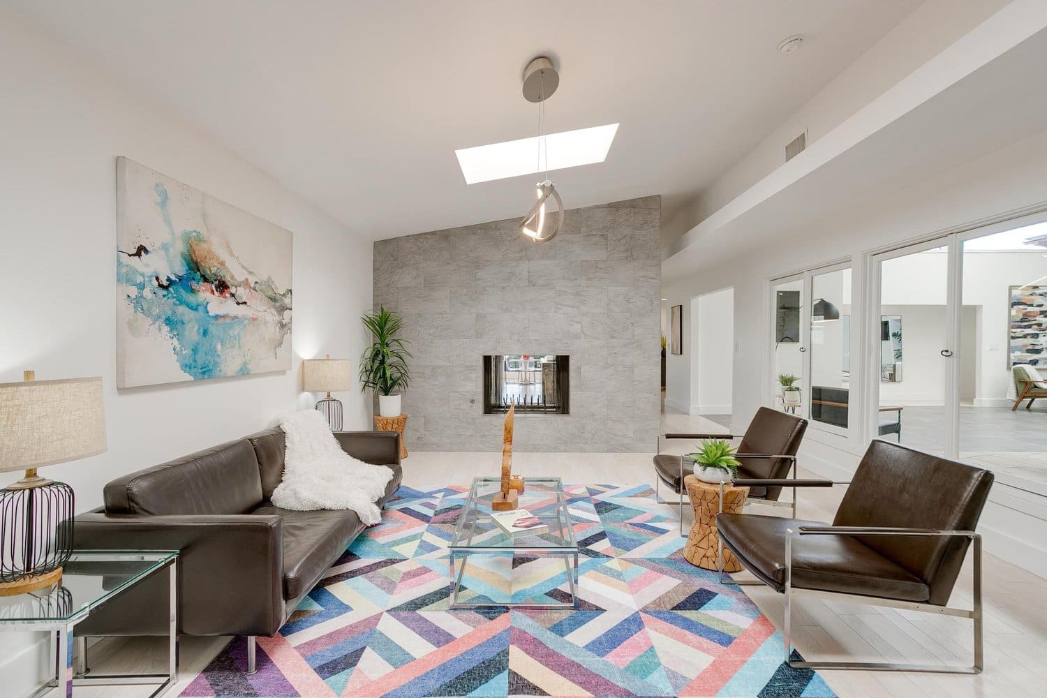 3401 Dorothy Lane – The cozy den with its see-through fireplace.