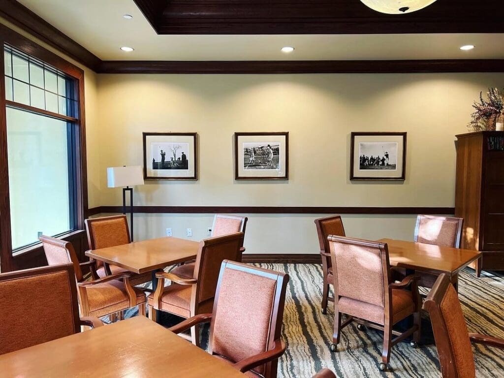(Before) Three vintage golf photos from the club were moved to a better location to spotlight them.