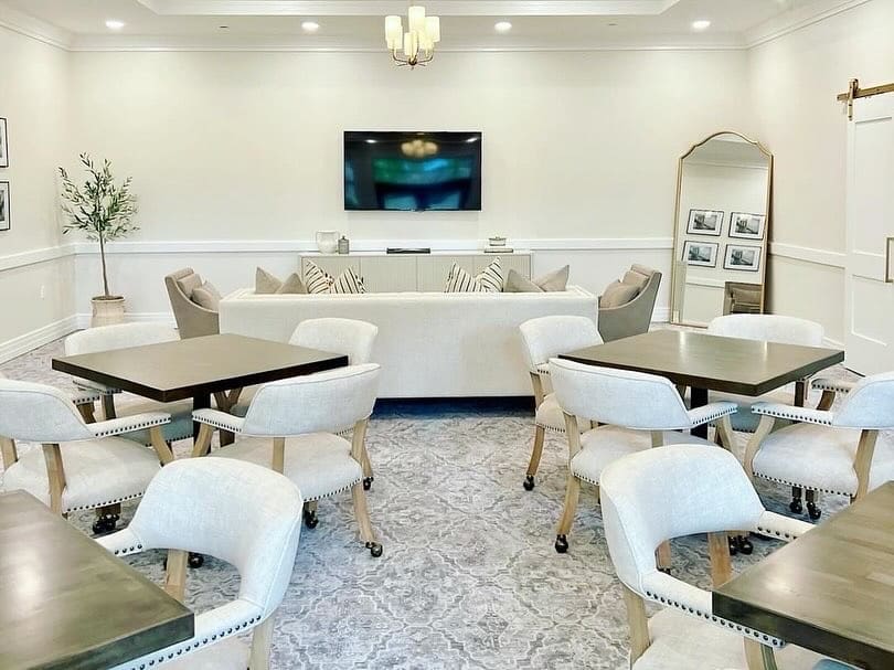 The seating area at The Woodlands Country Club's laddies lounge still has plenty of room for cards and games, but is much lighter and inviting now.