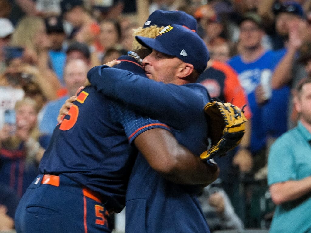 Ronel Blanco and Astros manager Joe Espada shared a long embrace after the 30-year-old journeyman's epic no hitter. (Photo by F. Carter Smith)