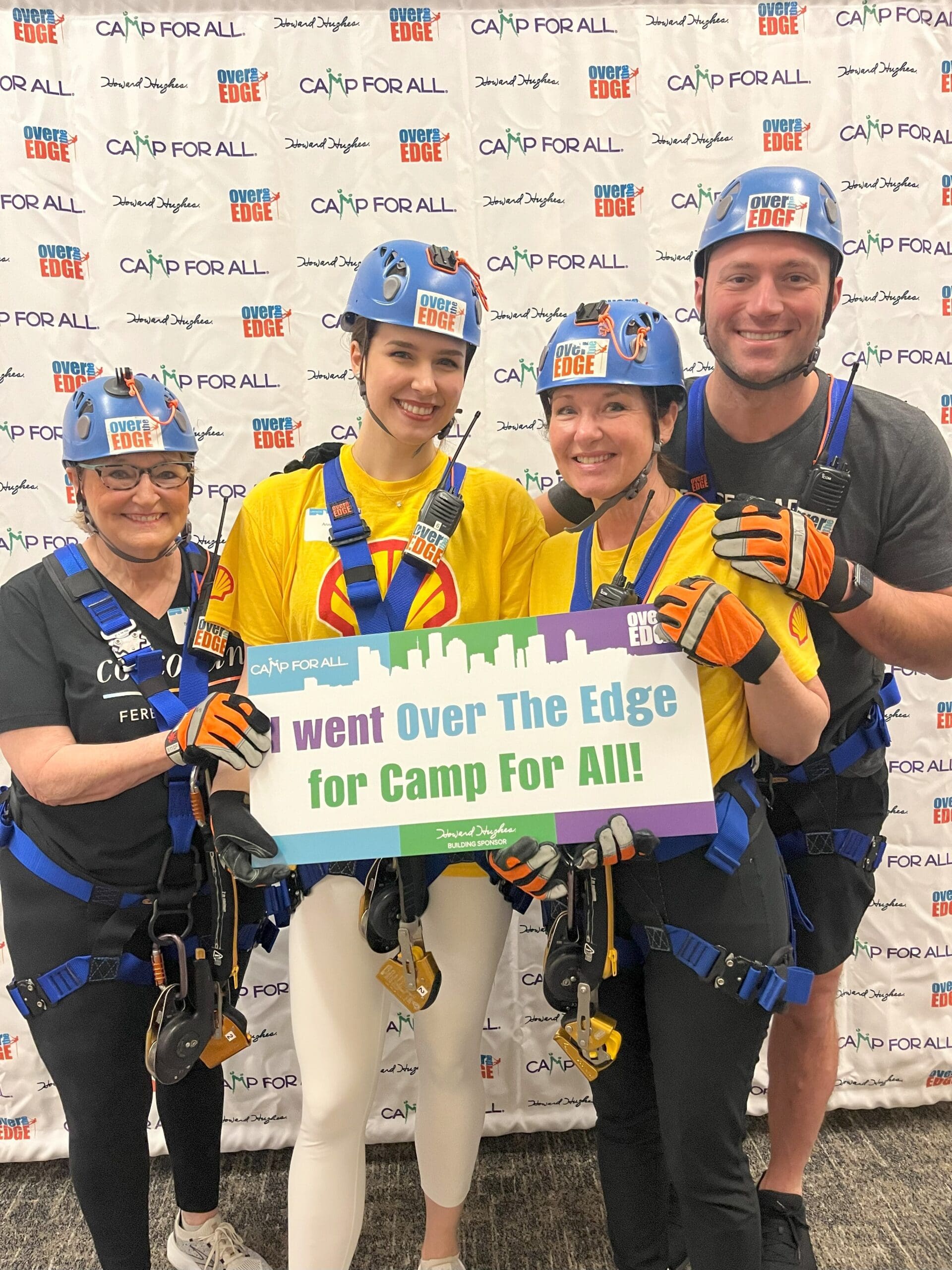 Beth Ferester-Corcoran, Annie Morelli, Stacie Pitts and Jonathan Ruzicka scaled the Howard Hughes building.