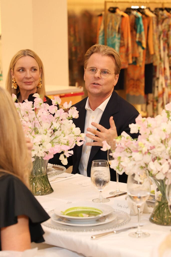 Designer Adam Lippes discusses his fashions parading throughout the luncheon at Neiman Marcus. (Photo by Photos by Priscilla Dickson)