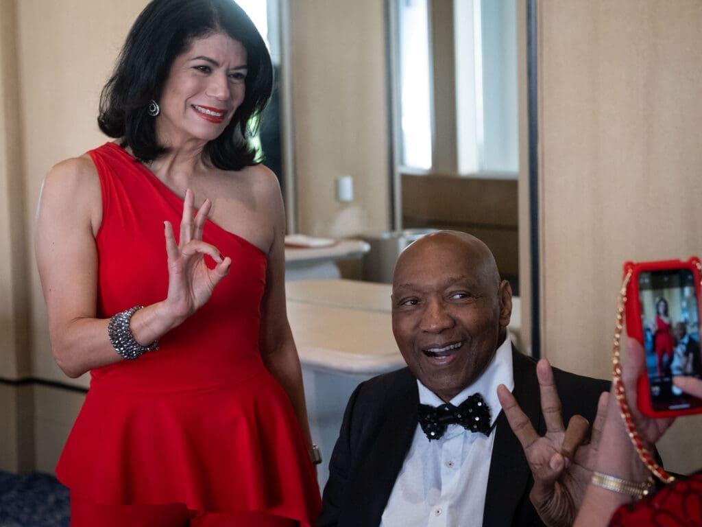 State Senator Carol Alvarado and Elvin Hayes are both proud University of Houston products. (Photo by F. Carter Smith)