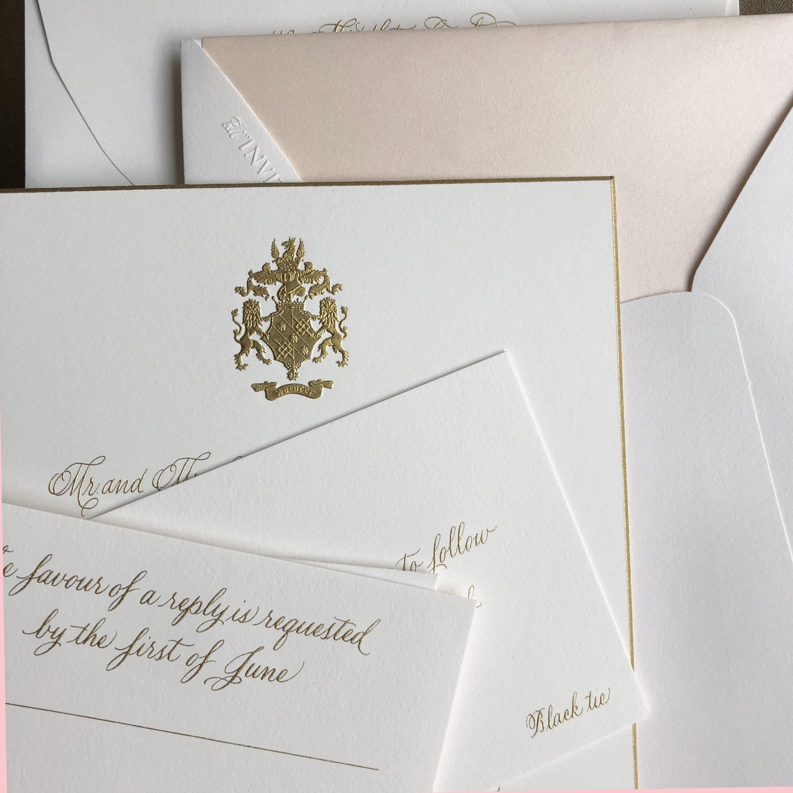 high society wedding invitation etiquette coat-of-arms_gold-emboss_bespoke-wedding-invitation_partial
