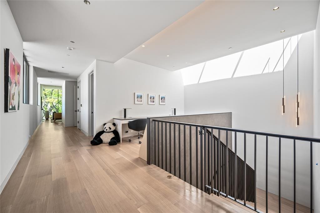 An upstairs landing doubles as an office or playroom.