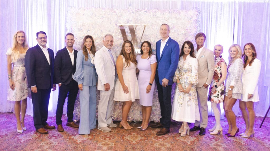 Missy Herndon (Interfaith of The Woodlands), Jim Parisi (St. Luke’s Health) and Community Champions Dr. Scott Greenberg, Courtney Pell Wilkerson, Bret Strong, Taylor Handfelt, Amber Scheer, Jim Carman, Julie and Scott Lile, and Alison Yee, and The Walk co-chairs Carrie Greenberg and Kristen Byrnes have a moment in The Woodlands.