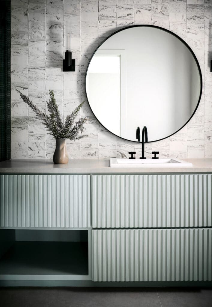A guest bath in the new-build at 2110 Del Monte in River Oaks (Photo by TK Images)