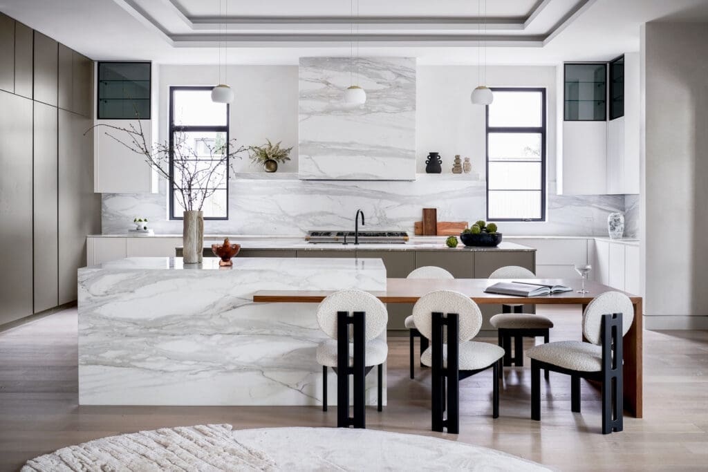 The breakfast bar overlooks the state-of-the-art kitchen at 2110 Del Monte. (Photo by TK Images)