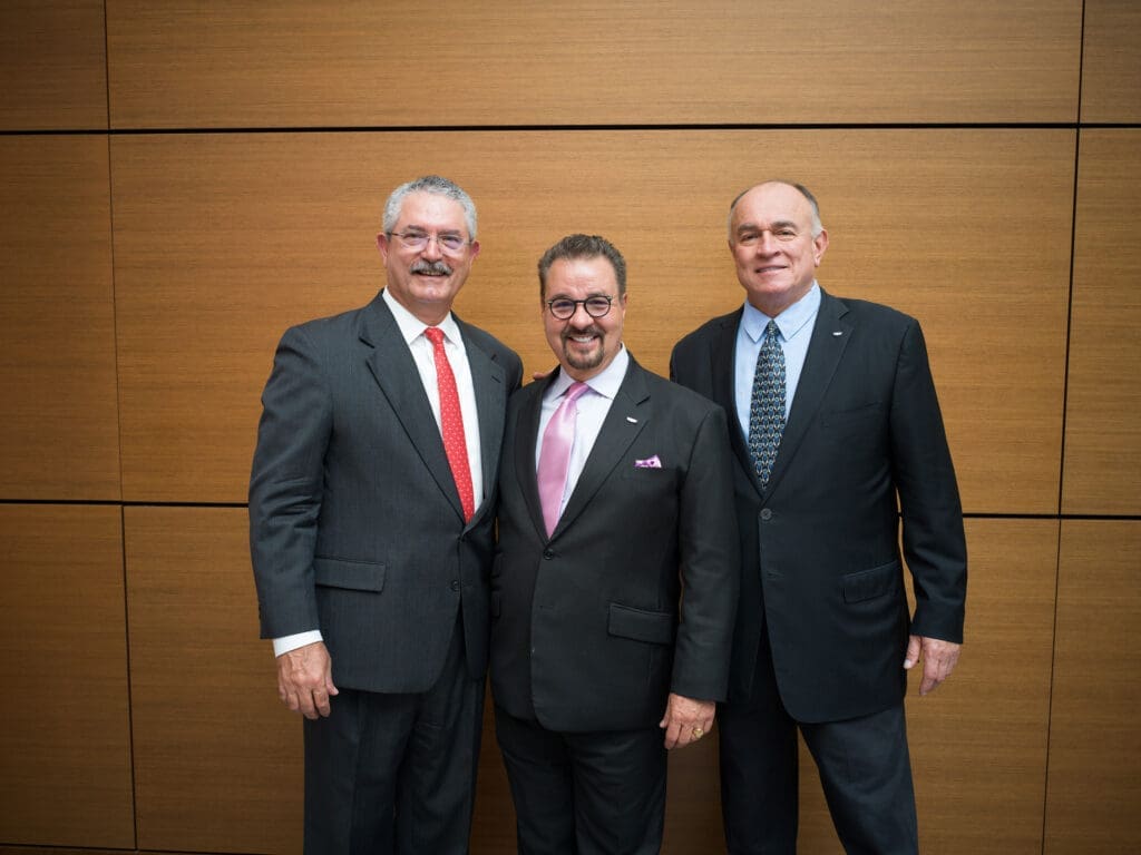 Candido Pagan, Fernando Somoza, Kirk Franceschini at the grand opening of Central Houston Cadillac's new location near NRG Park (Photo by Daniel Ortiz)