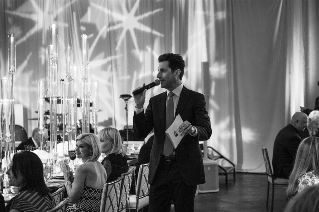 Emcee and auctioneer Matt Godbehere