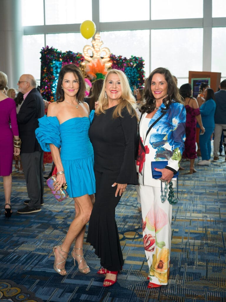 Jessica Rossman, Pam Bellin, Mauney Mafrige at the Latin Women's Initiative fashion show and luncheon. (Photo by Daniel Ortiz)