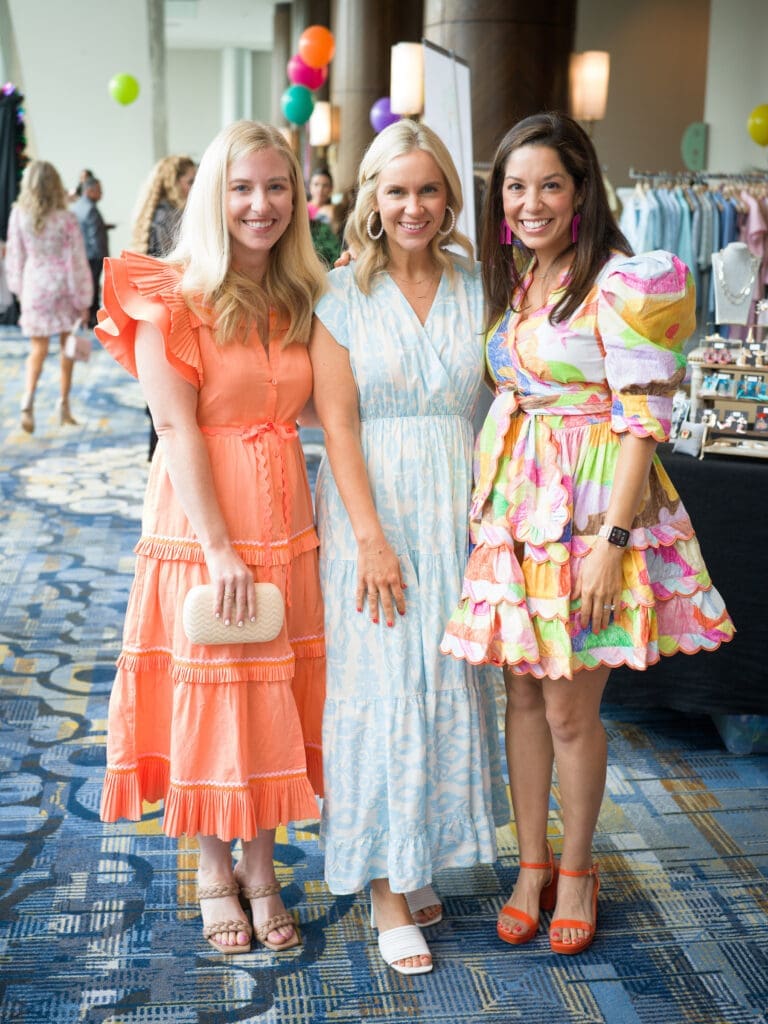 Kat Reyes, Meredith Reyes, Melissa Wilmoth at the Latin Women's Initiative fashion show and luncheon. (Photo by Daniel Ortiz)