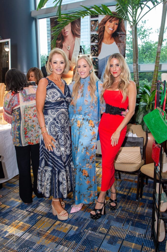 Lorena Gomez, Whitney Lawson, Andrea Simmons at the Latin Women's Initiative fashion show and luncheon. (Photo by Jacob Power)