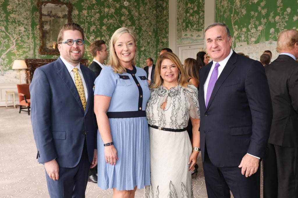 Taylor Kidd, Kim Koehn, Leticia & Steve Trauber at the Men of Distinction luncheon