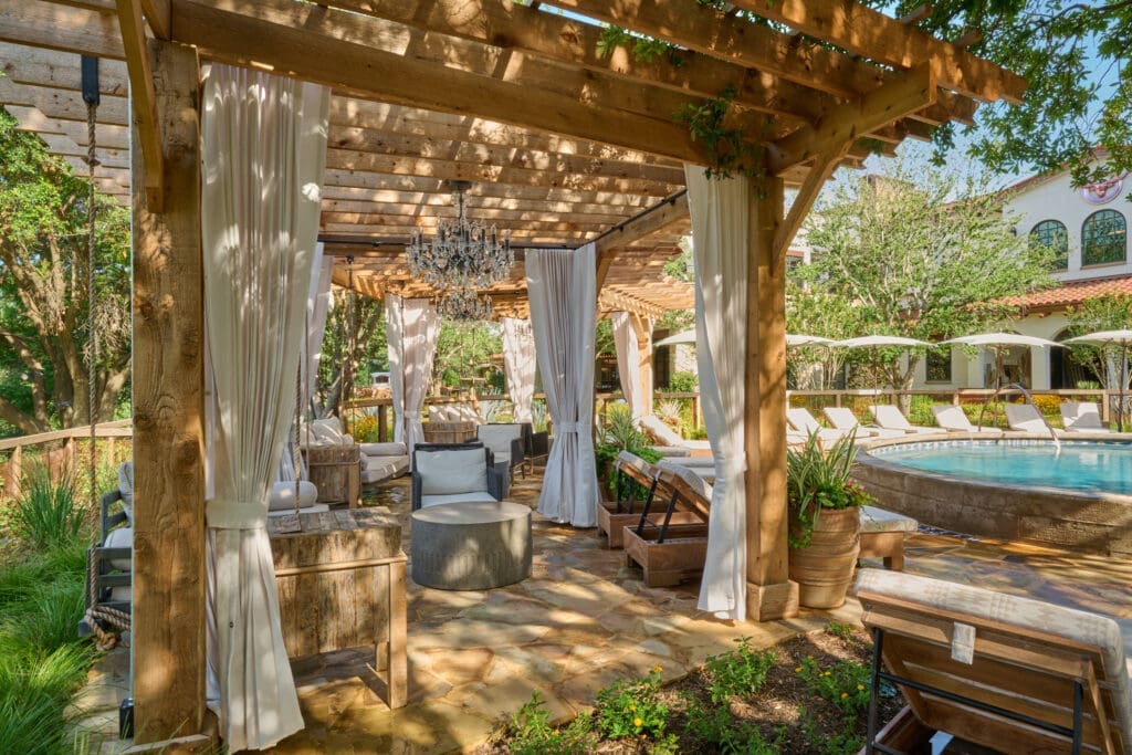 Hotel Drover's shady cabanas and pool feel like an epic backyard.