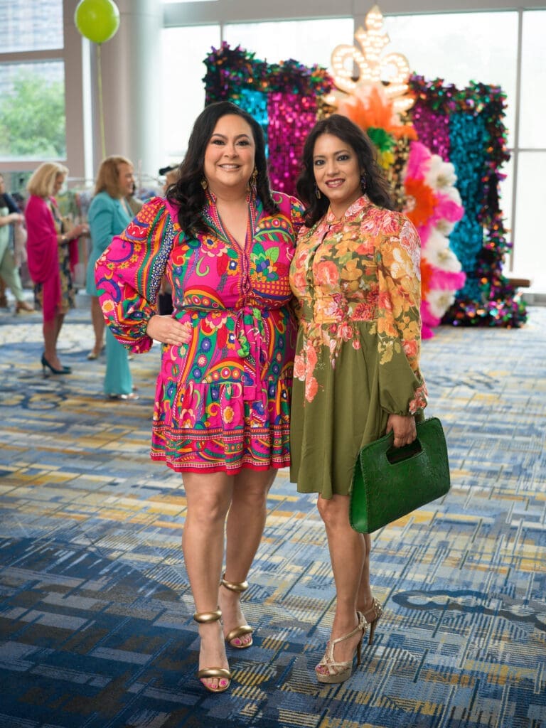 Vicki Luna, Conchita Reyes at the Latin Women's Initiative fashion show and luncheon. (Photo by Daniel Ortiz)