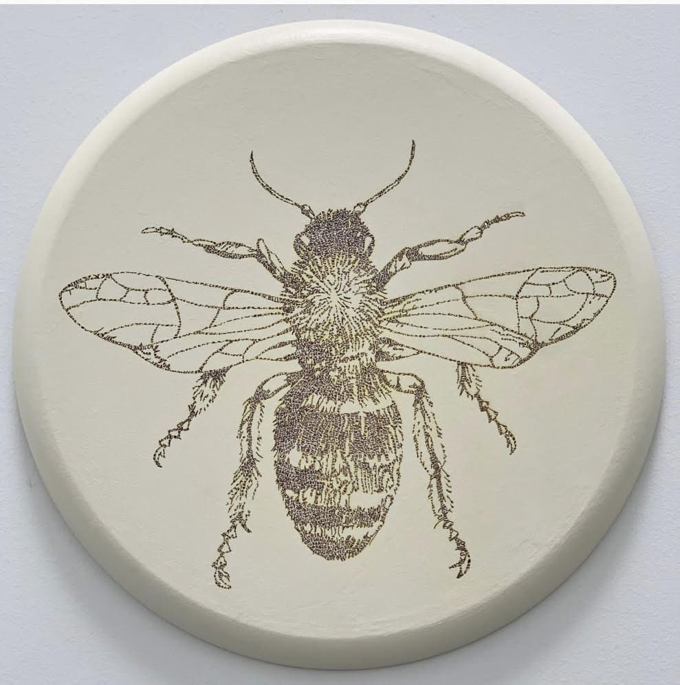 The bee, by word artist Marlo Saucedo.  Tiny words make up this unique piece of art. (Photo courtesy of Marlo Saucedo)