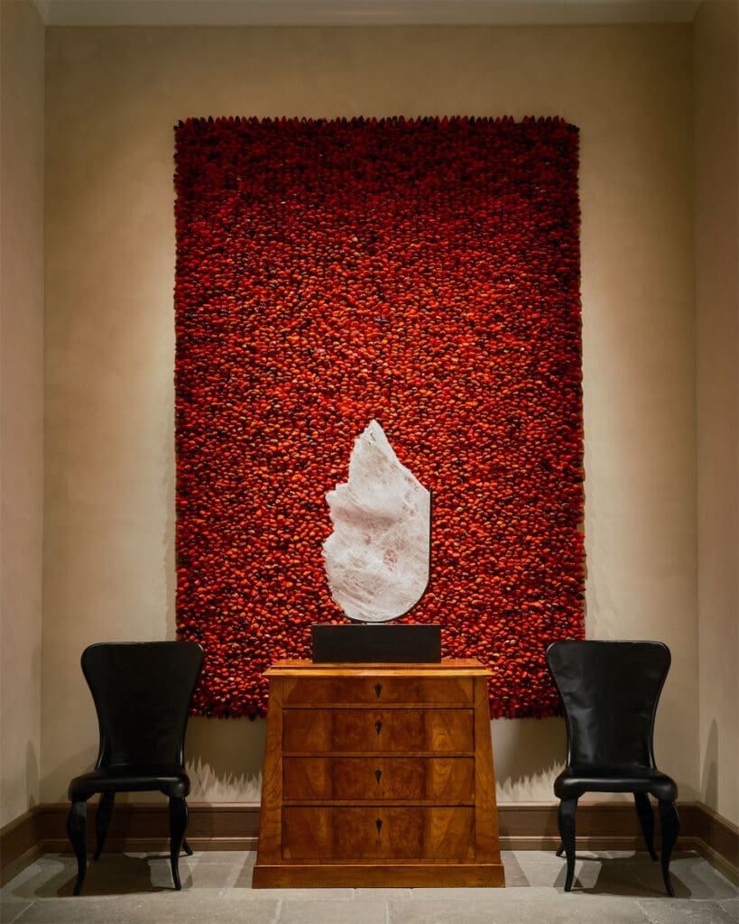 Hundreds of red neckties make up the elevator bank artwork. 