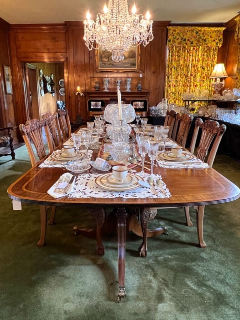 The green rug of the dining room is believed to have once been in the Treaty Room at the White House.a (Photo by Dallas Estate Sellers)