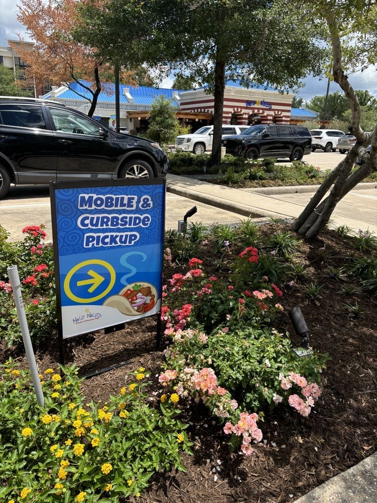 A dedicated curbside/mobile pickup area at Niko Niko's should keep things moving smoothly inside the restaurant.   (Photo by Laura Landsbaum)