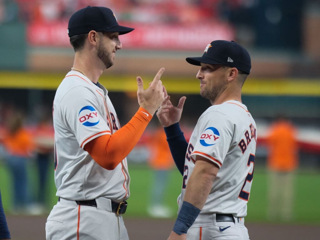 Kyle Tucker and Alex Bregman are still celebrating big Astros moments together. (Photo by F. Carter Smith)