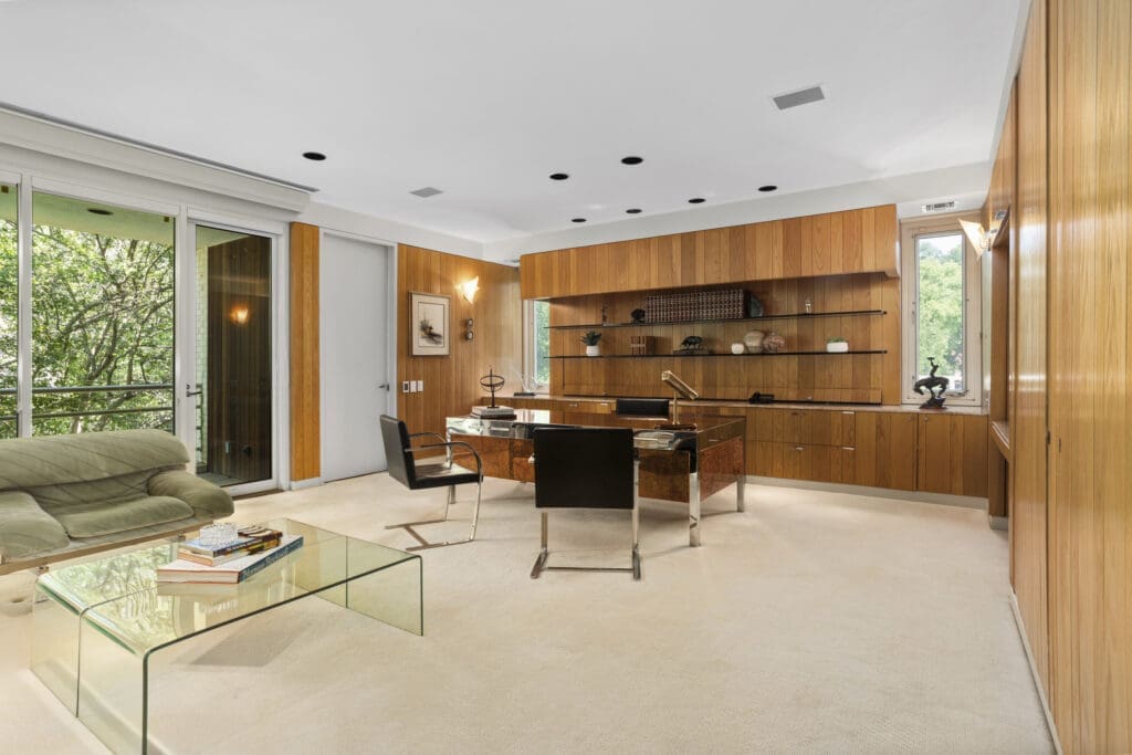 Wooden built-ins inside 3950 Sarita Park Court's grand home office.