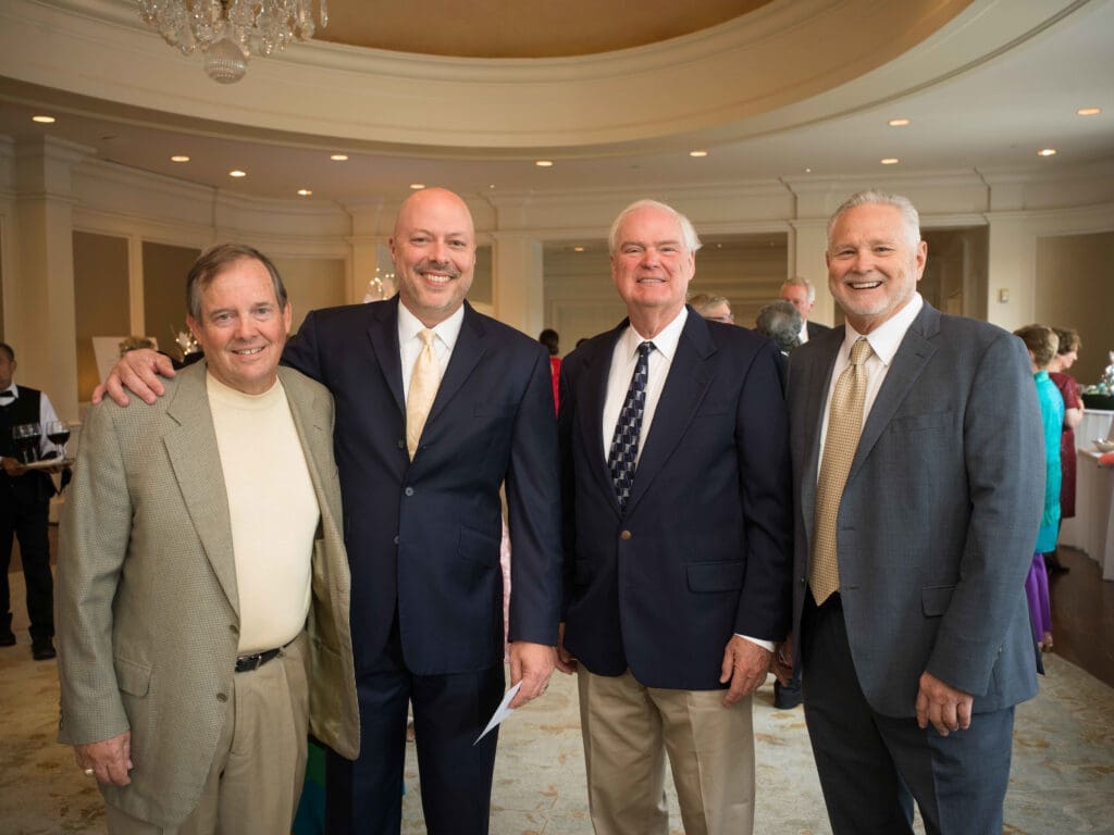 Larry Cress, Austin Bradshaw, Regan Wood, Jeff Cummins at the Houston Furniture Bank dinner  (Photo by Daniel Ortiz)