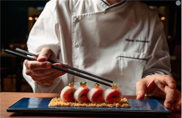 Beautifully presented maki rolls include the Naruto, named for the Naruto Strait in Awaji and Shikoku, which blends salmon, chutoro and hamachi with shiso leaves all wrapped with pickled daikon and served with a Yuzu ponzu. (Photo by Brian Kennedy)