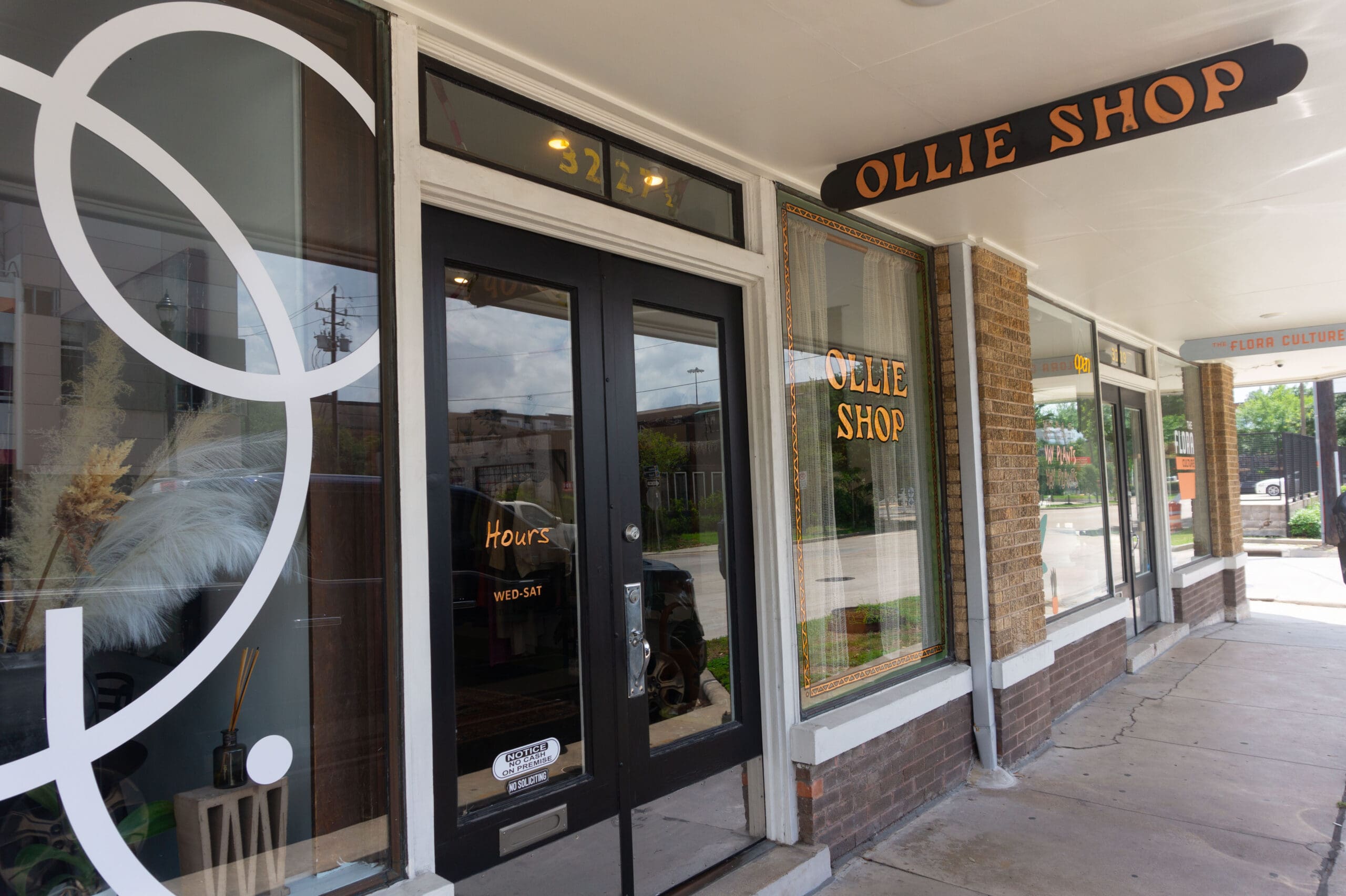 Ollie Shop's storefront features a store sign with copper leafing. (Photo by Sofia Westerman)