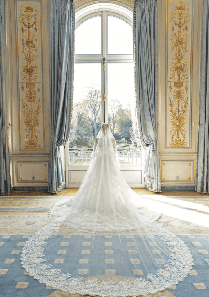 Bride Maggie Phillips in wedding gown by Monique Lhuillier at Cercle de I’Union Interalliée, an exclusive private club in Paris. (Photo by John Cain Photography)