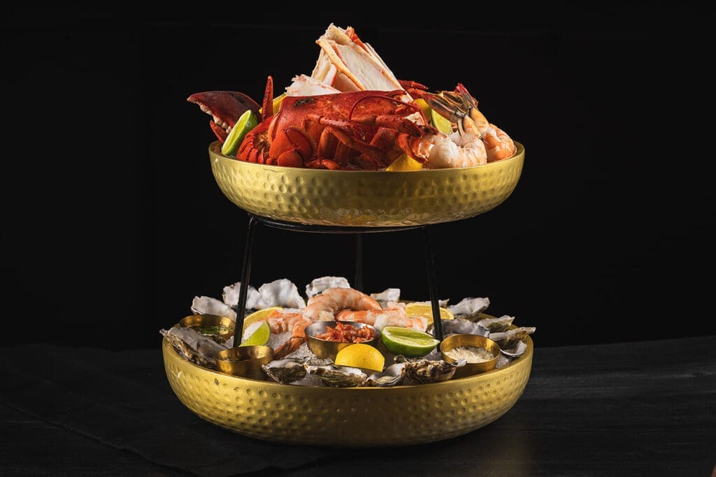 Toca Madera's Mariscos is an array of impeccably fresh chilled seafood including oysters, jumbo prawns, king crab and lobster tail on ice ($195/$325).