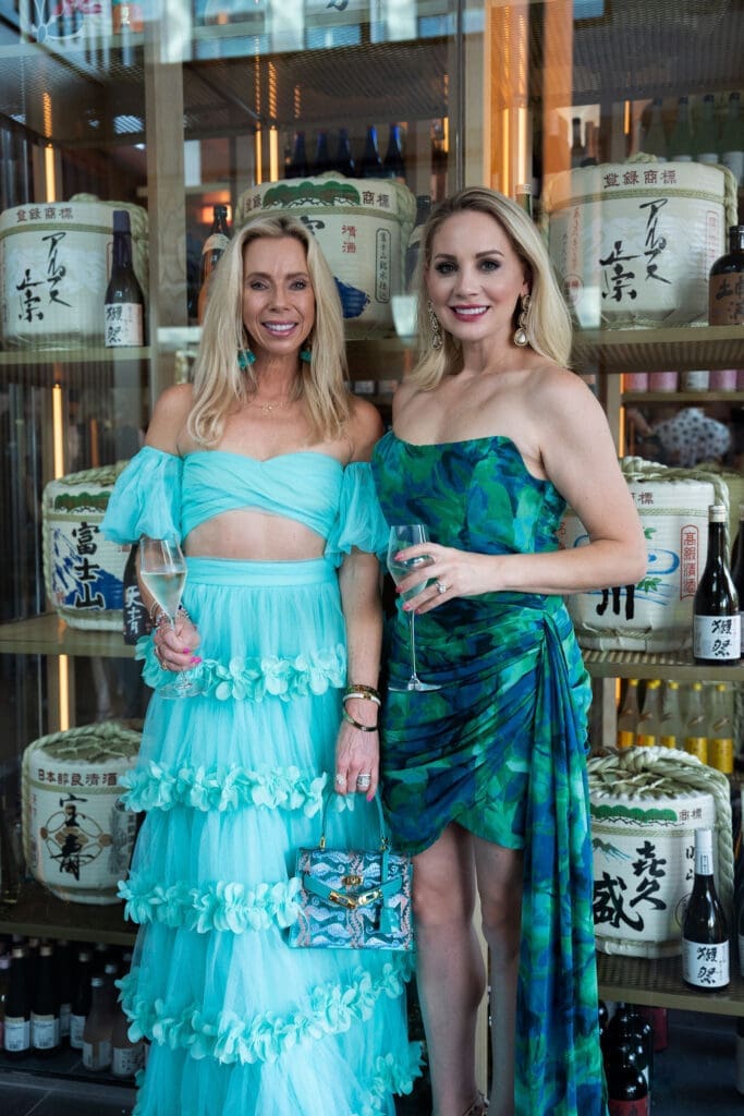 Star Hand and guest at the opening of Azumi in River Oaks District. (Photo by Jonah Tijerina)